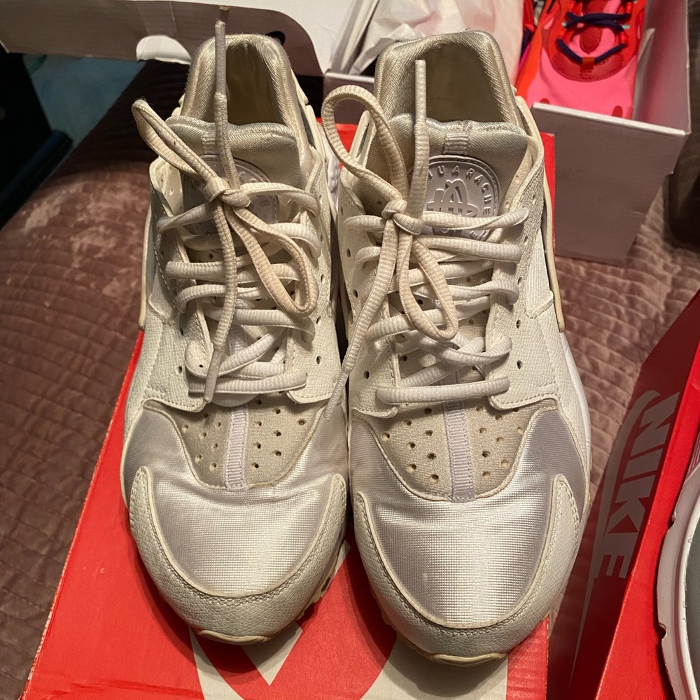 Nike Huarache… creame and white color. Has some wear but still has a lot of life